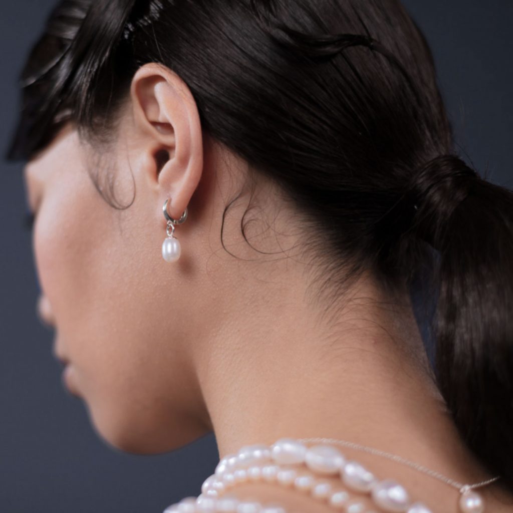 Woman wearing Pearls